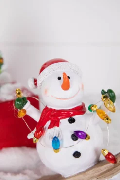 7.4” B/O Lighted Resin Skiing Snowman with Light String