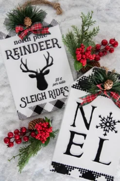 12” Metal Embossed Holiday Wall Sign with Floral Accent